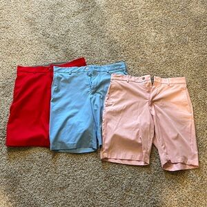 3 Walter Hagen #11 golf shorts size 32 in pink, red and blue.